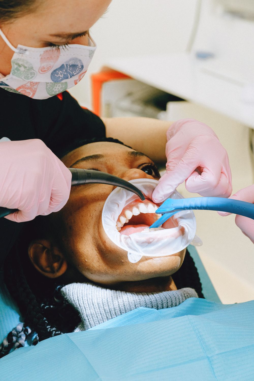 A patient receiving urgent dental treatment
